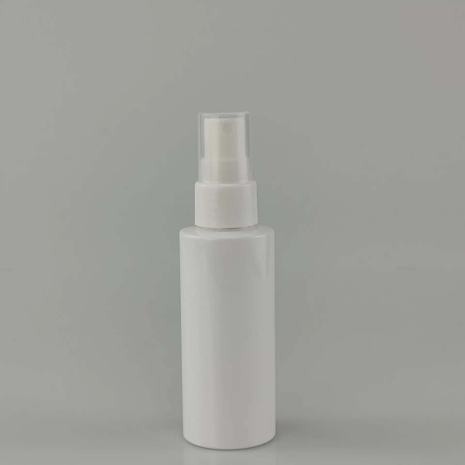 60ml Glossy White PCR PET Fine Mist Spray Bottle With Sealed Pump For Cosmetic Packaging
