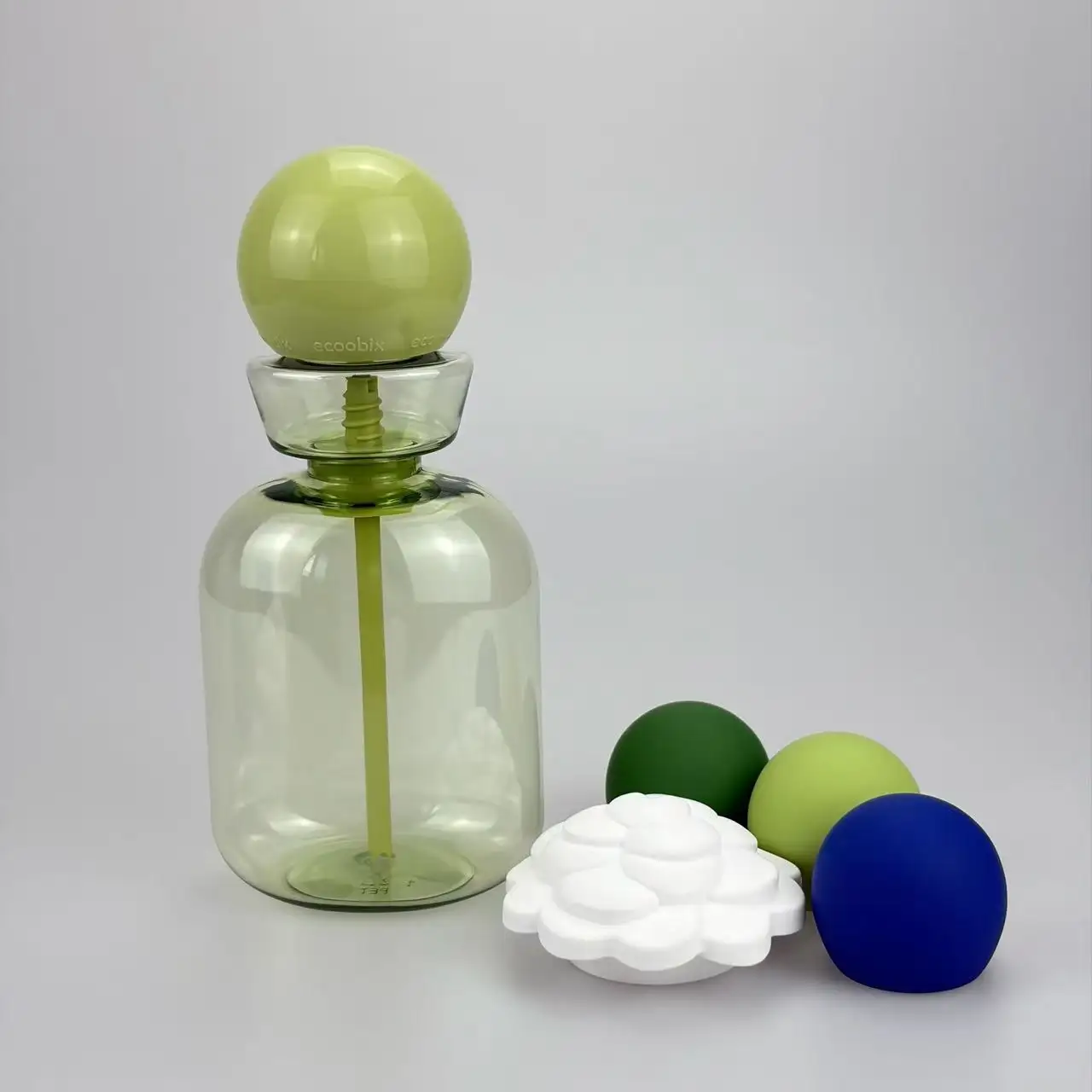 This is a colorful PET pump bottle with interchangeable ball-shaped caps, primarily designed as an oral rinse/mouthwash dispenser.Colorful mouthwash dispenser