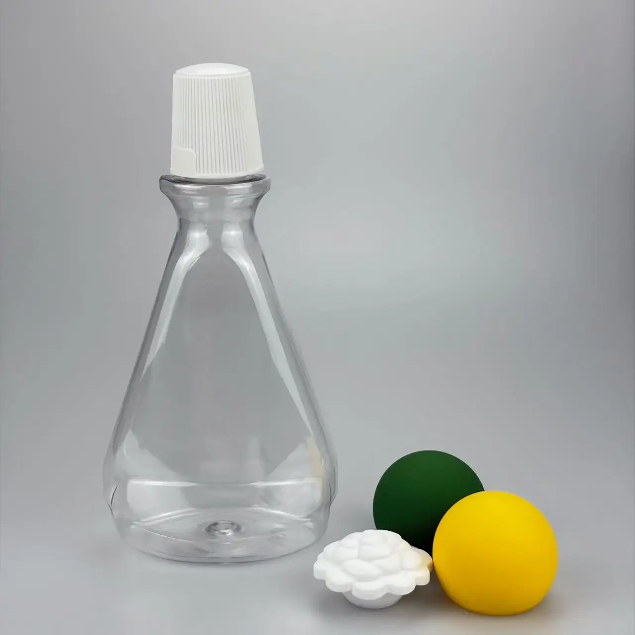 Safe and durable Oral Rinse Storage Bottle made of food-grade clear PET. 210ml conical shape with tight-sealing cap, perfect for retail and commercial oral care packaging.